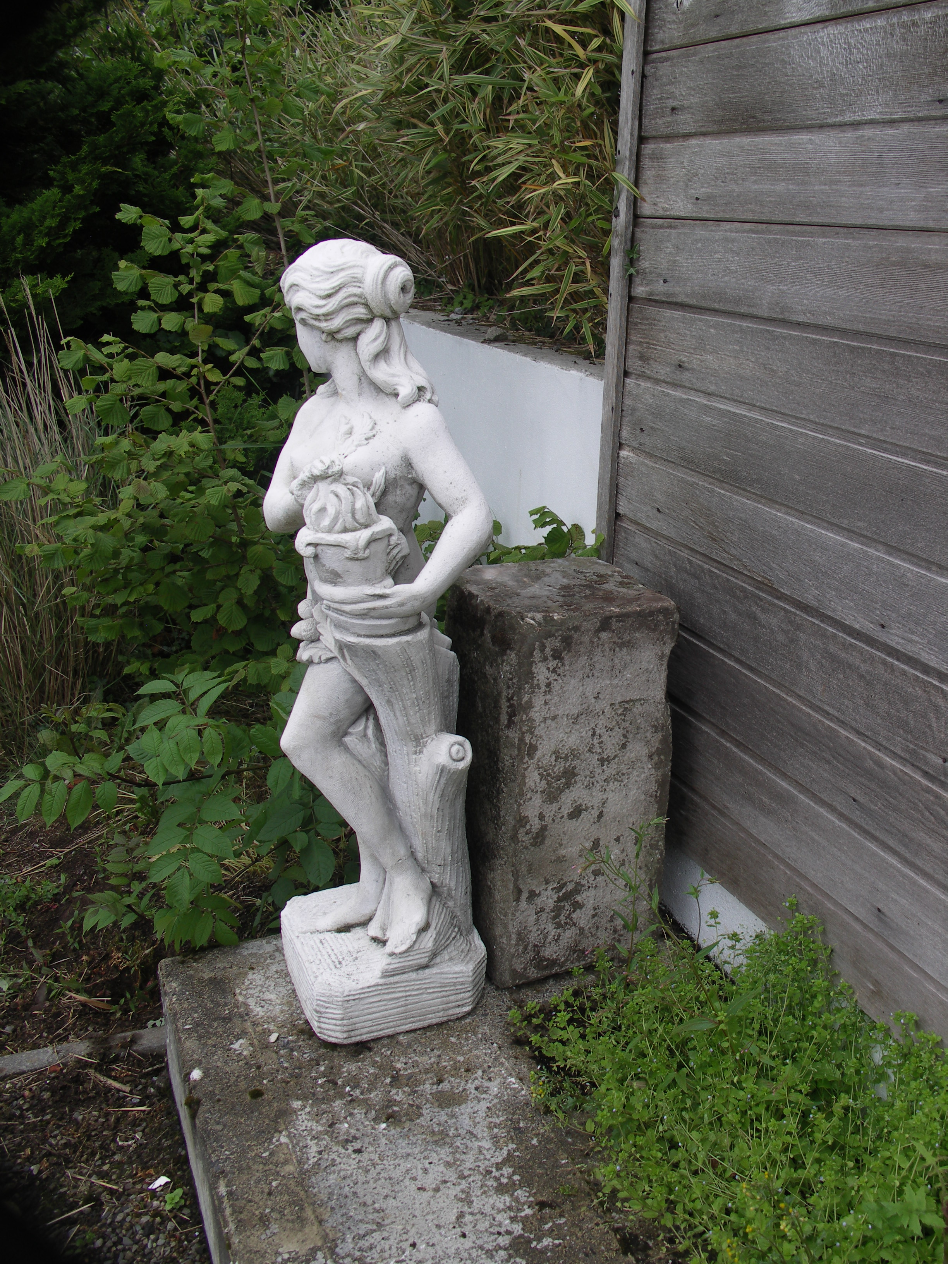 garden statue with stone plinth
