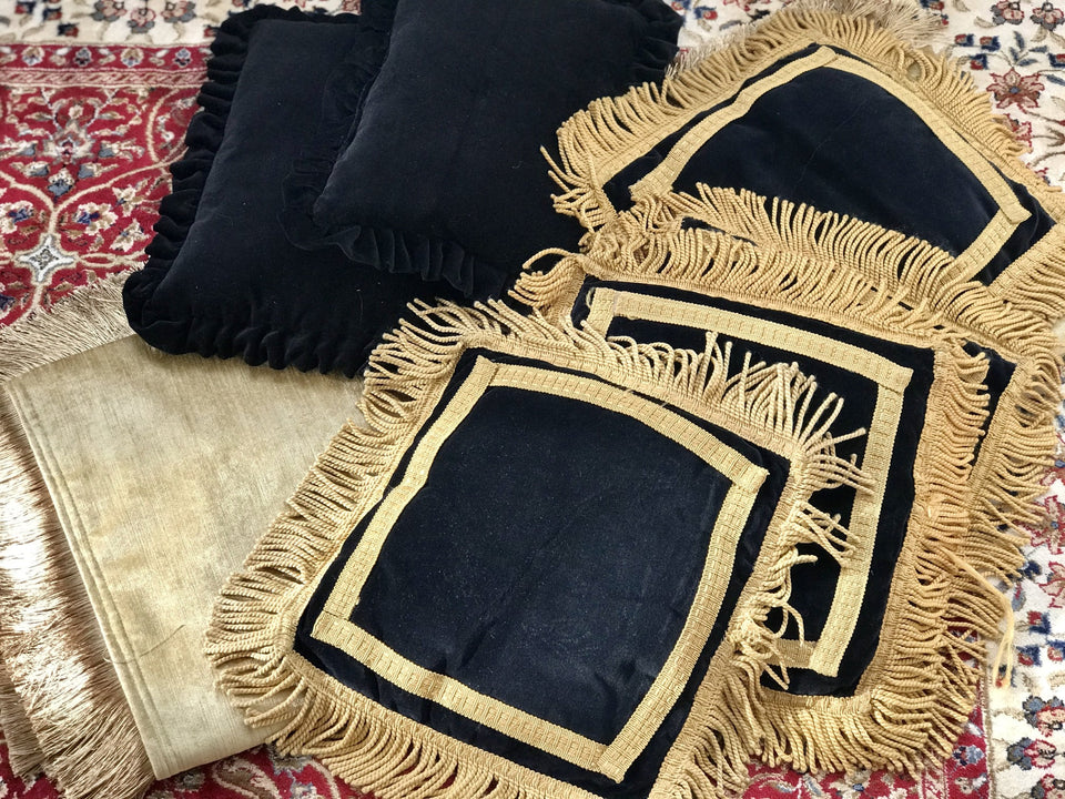 distinctive black and gold velvet cushions