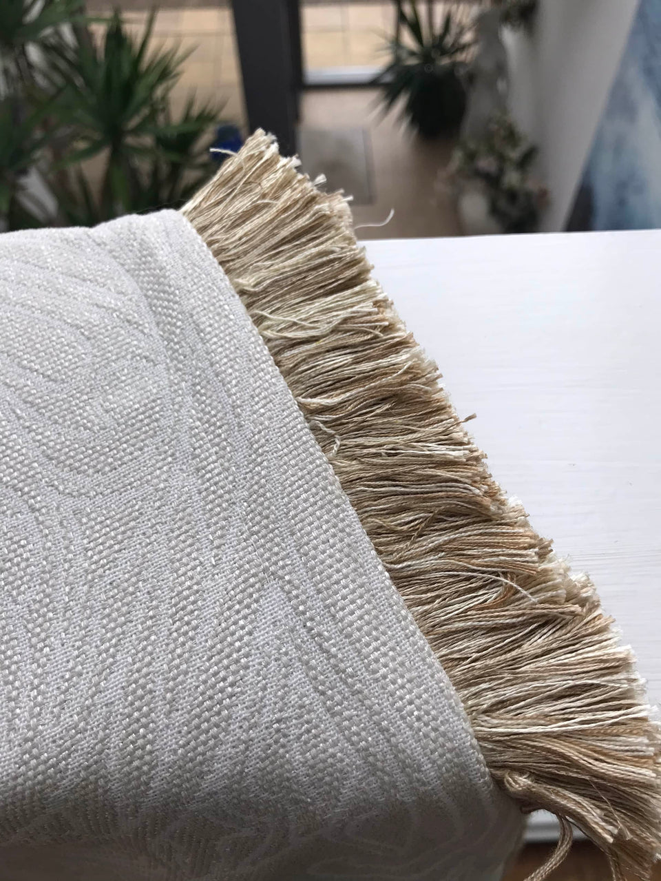 Heavy Cream Throw with a Subtle Floral Pattern