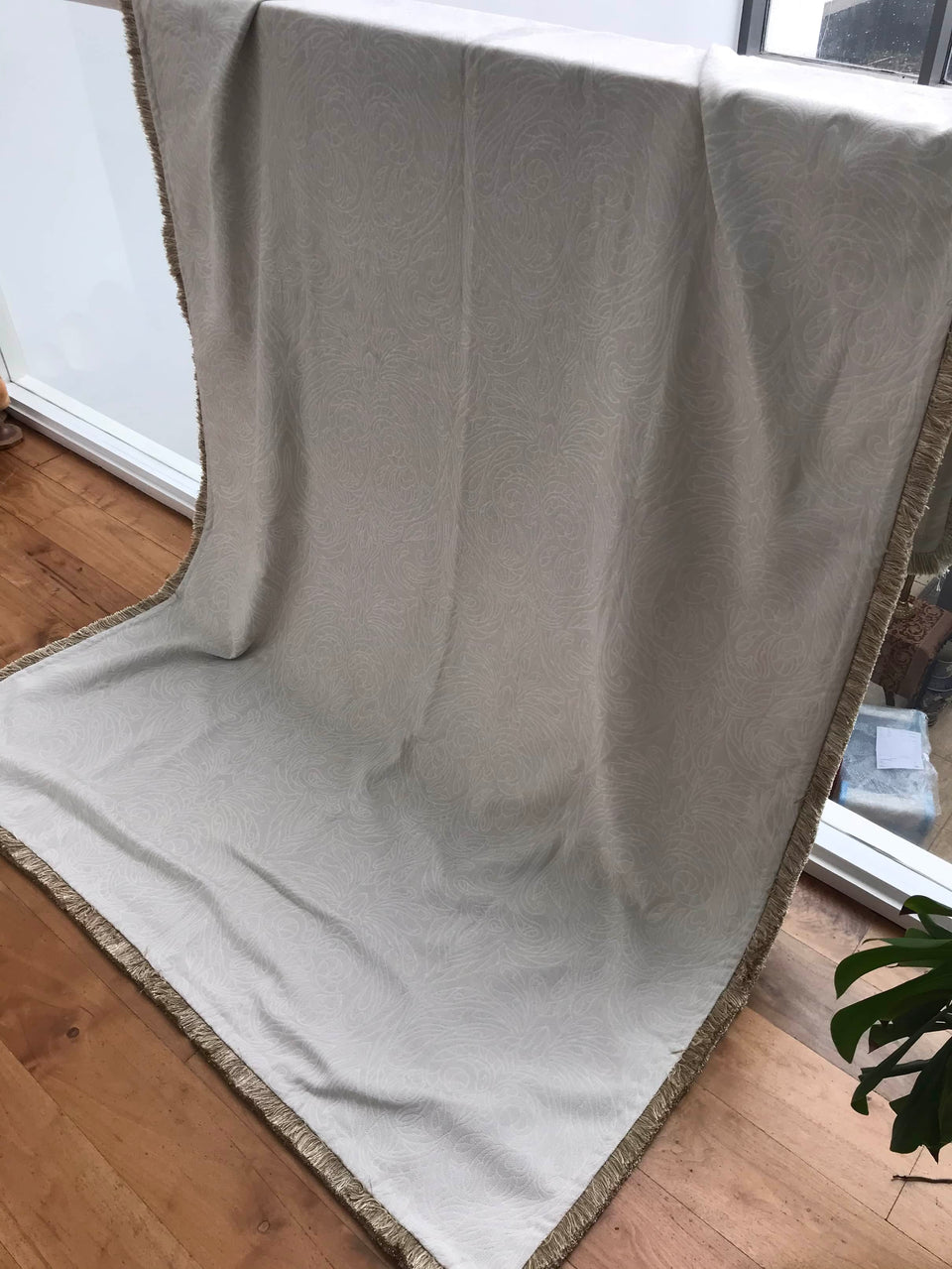 Heavy Cream Throw with a Subtle Floral Pattern