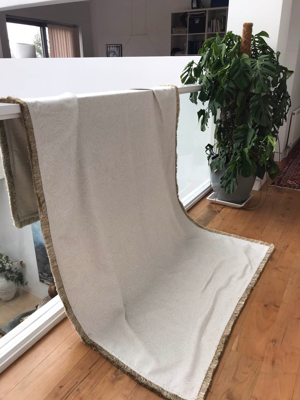 Heavy Cream Throw with a Subtle Floral Pattern