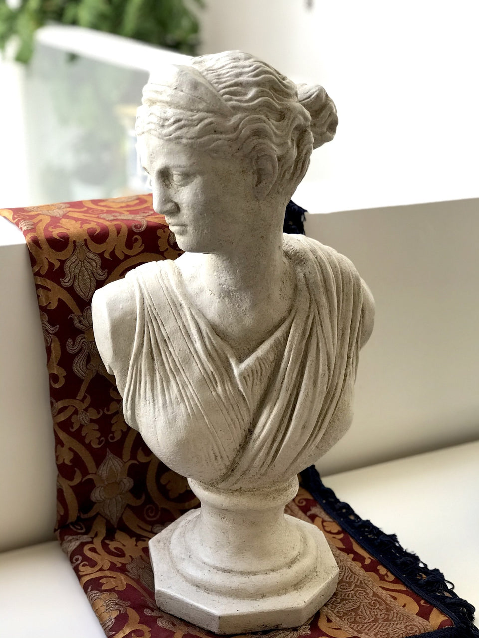 Classical bust of a young woman