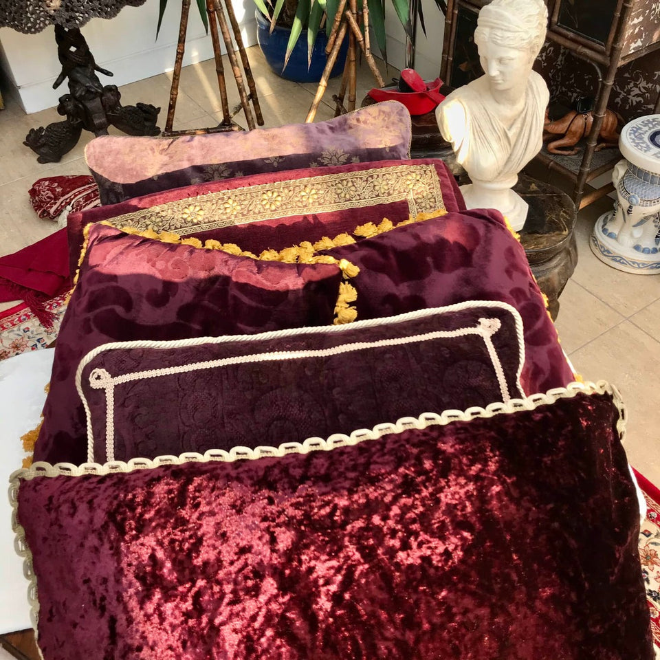 collection of purple cushions