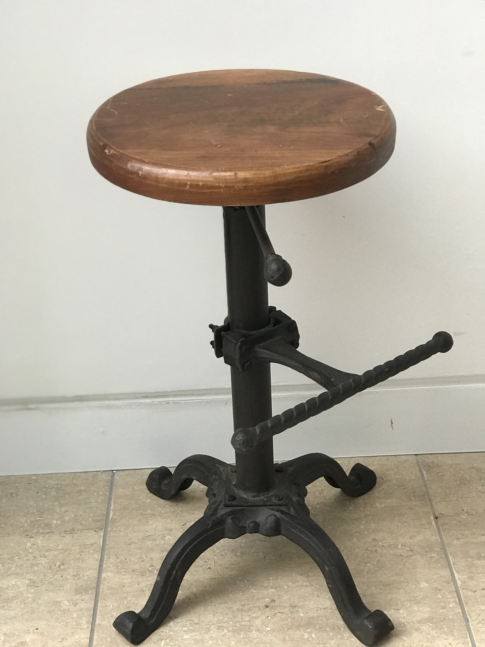 Vintage industrial stool with foot rest