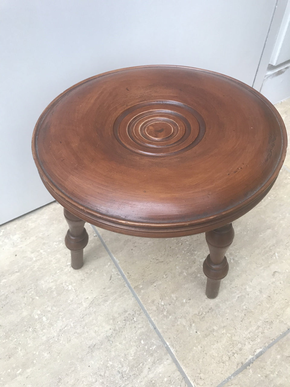 antique wooden milking stool